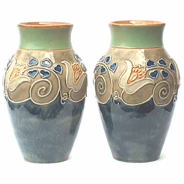 A pair of striking Royal Doulton Vases by Florrie Jones