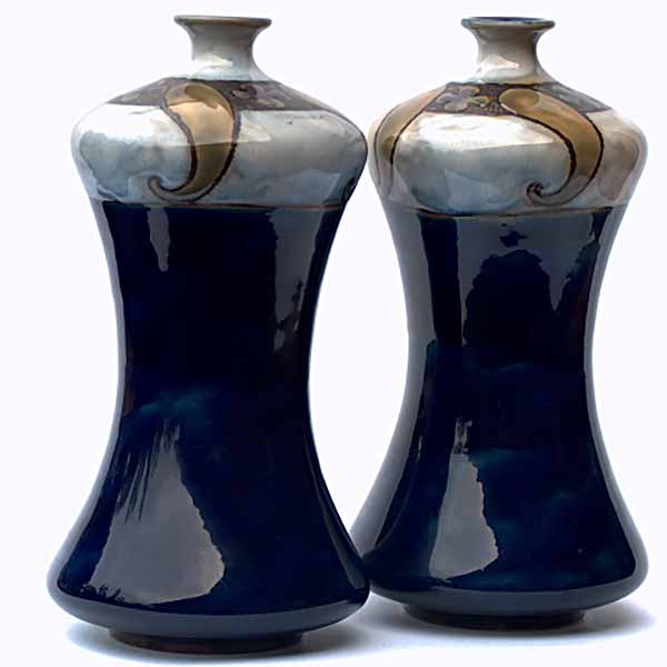A pair of 8.25" vases by Bessie Newbery 7408