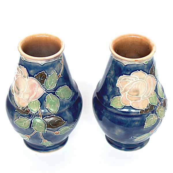 An Art Nouveau Royal Doulton pair of 7.5" vases by Jane Hurst - 7816N