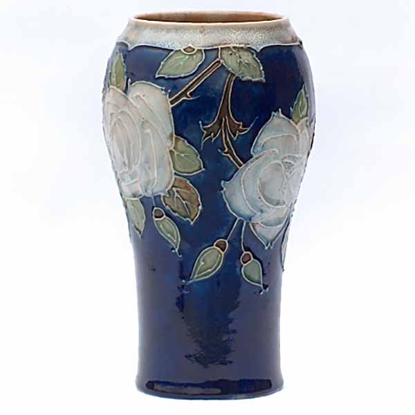 A Royal Doulton 9in vase in Art Nouveau style by Florrie Jones
