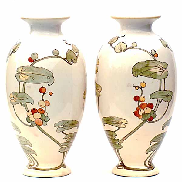 Agnes E M Baigent - a pair of 23cm (9in) Doulton Lambeth Faience vases  - 63