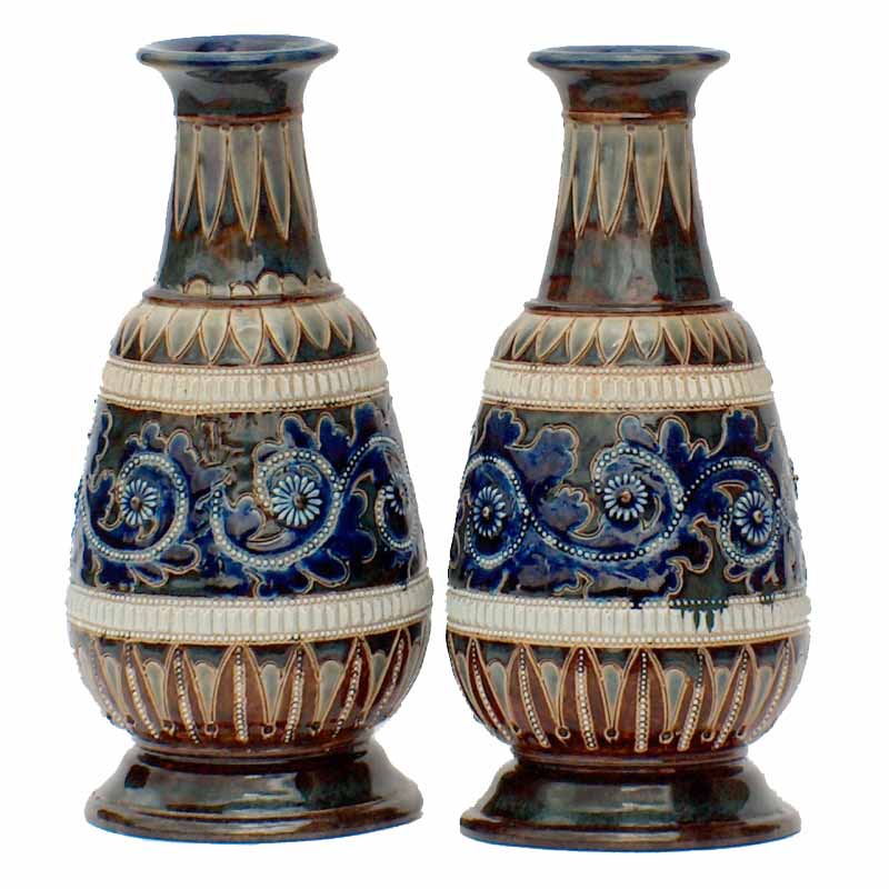George Tinworth - A Doulton Lambeth pair of 20cm (8in) vases dated 1878