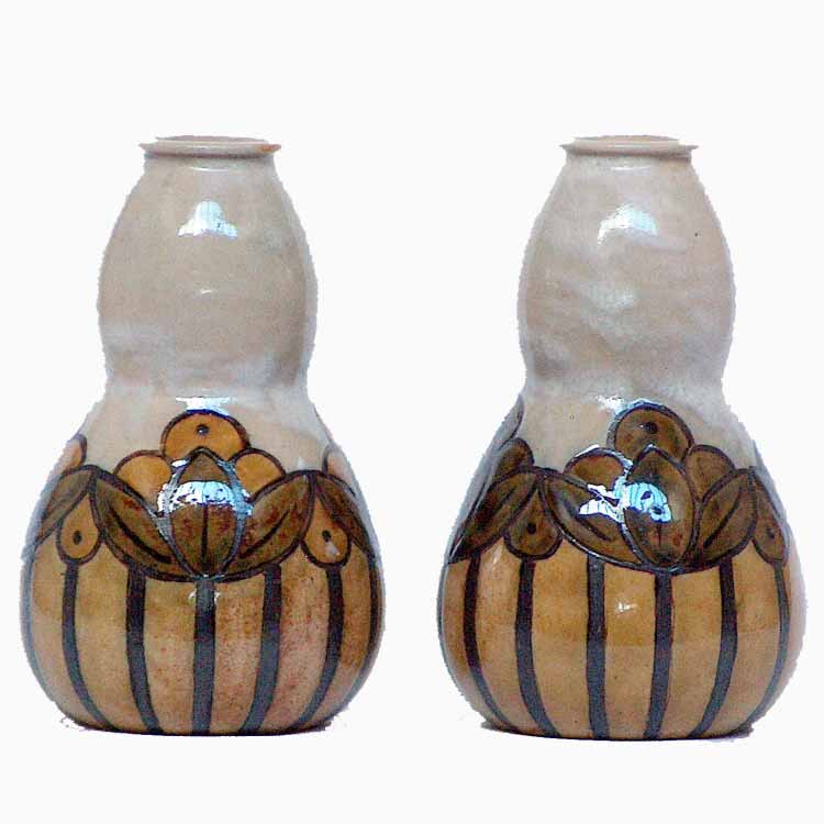 A pair of 6in (15cm) Royal Douton vases by Bessie Newbery - 8007