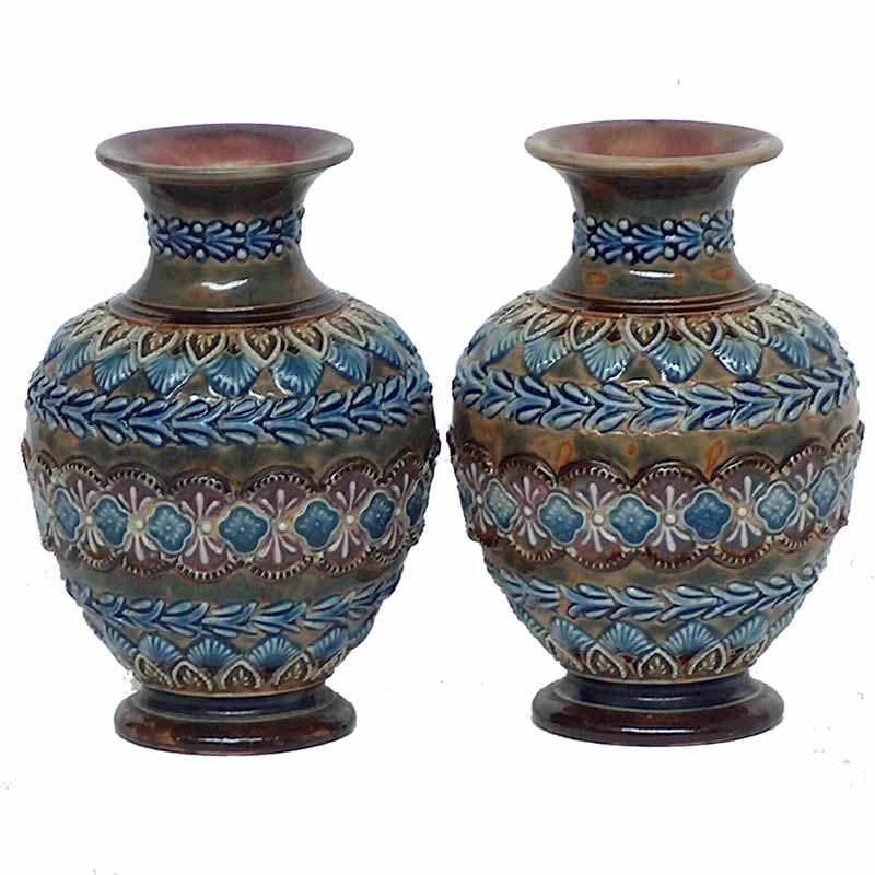Kate Davis - A Doulton Lambeth pair of 10cm (4in) vases dated 1881