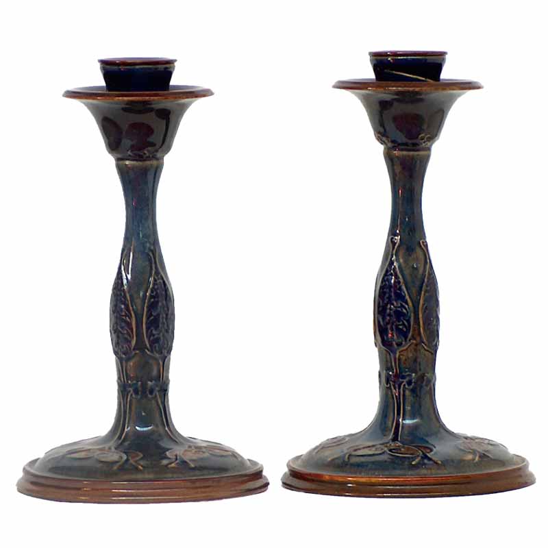 A pair of Doulton Lambeth 9in (22.5cm) candlesticks by Marion Holbrook