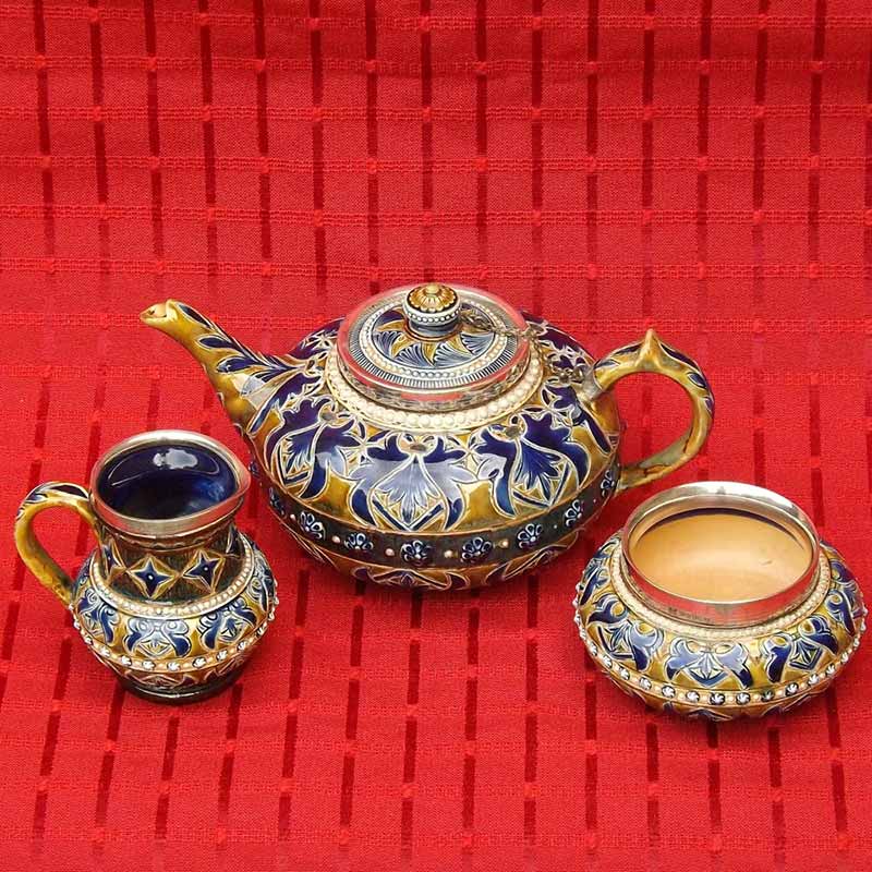 Edith Kemp - a Doulton Lambeth 3-piece tea set