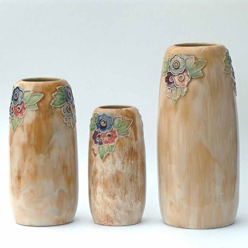 Three Royal Doulton Art Nouveau stoneware vases