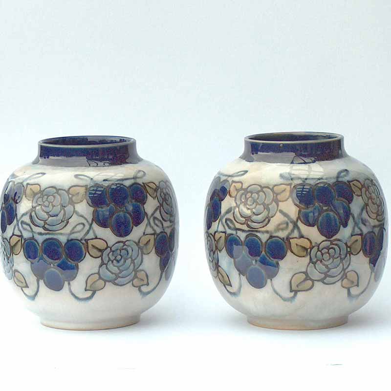 Pair of globular Royal Doulton stoneware vases