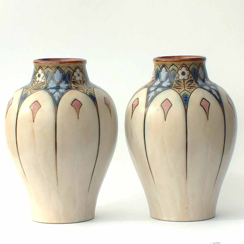 Pair of |Royal Doulton Art Deco stoneware vases (probably Francis C Pope)