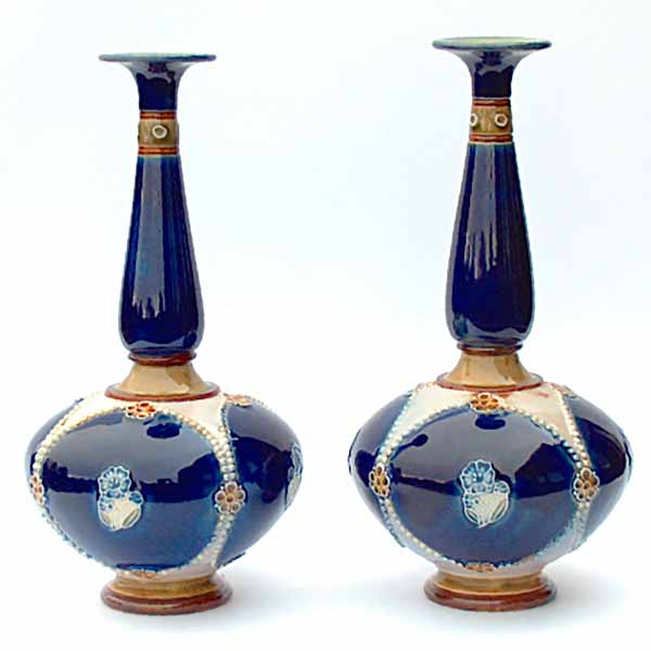 A pair of superb Royal Doulton vases by Christine Abbott and Winnie Bowstead